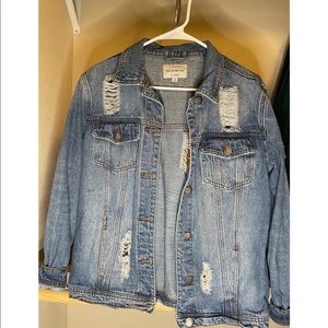 Distressed denim jacket